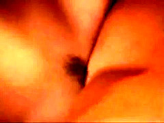 Brunettes Tribbing in Front of Fireplace